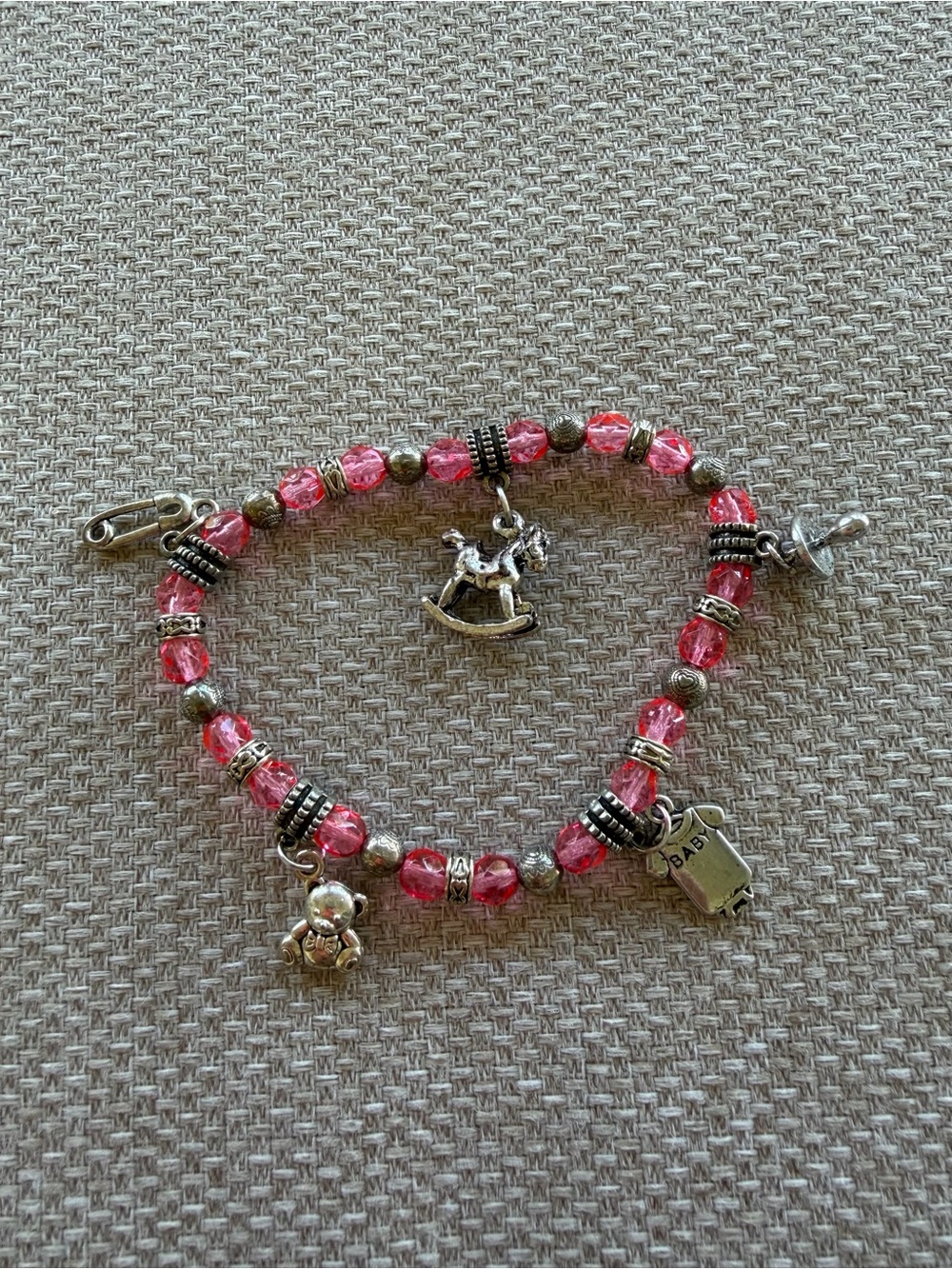 Pink Beaded Charm Bracelet with Rocking Horse and Baby Charms